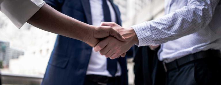 two people shaking hands