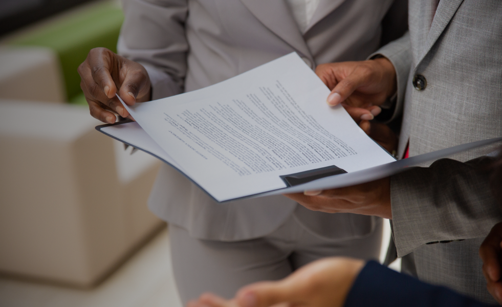 3 people reviewing documents